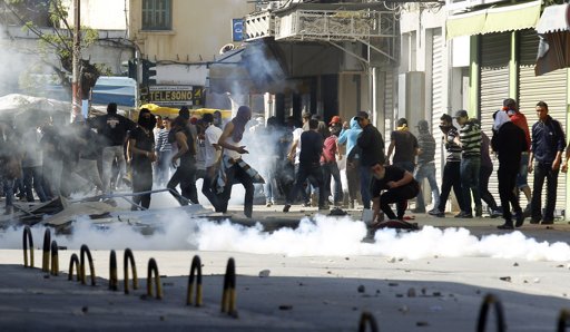 2013-04-16T170530Z_361004179_GM1E94H01FY01_RTRMADP_3_TUNISIA