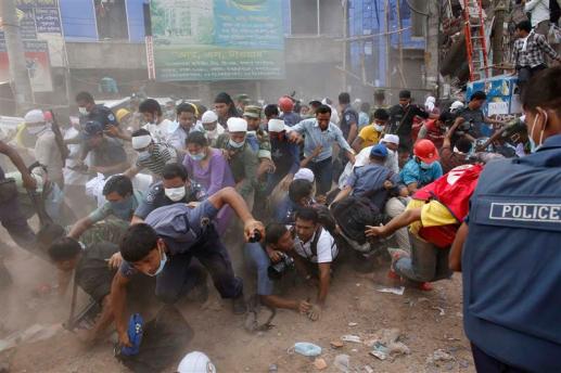 People run after they heard someone shouting that a building next to Rana Plaza is collapsing during a rescue operation in&nbsp;Savar