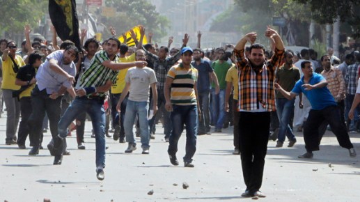 Clashes between supporters of Mohamed Mursi and anti Mursi protesters during march in Shubra street in&nbsp;cairo