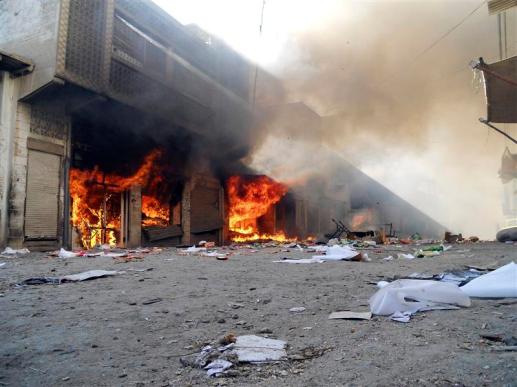 Stalls at a market burn after it was set on fire during sectarian clashes in Kohat, Khyber Pakhtunkhwa&nbsp;province