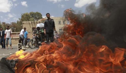 Protesters burn tyres during a demonstration against Yemen&rsquo;s fuel shortages in&nbsp;Sanaa