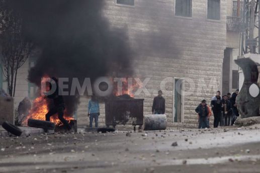 1428706687-palestinians-from-beit-omar-clash-with-israeli-forces–west-bank_7315509